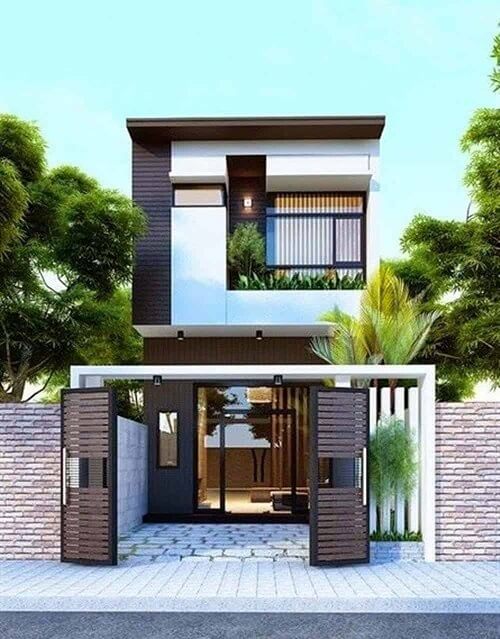 Một khoảng sân nhỏ phía trước tạo sự thông thoáng cho ngôi nhà